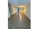 Inviting living room with wood floors and open kitchen view at 125 Odyssey Turn, Conyers, GA 30012