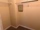 Spacious walk-in closet featuring shelving and a safety panel at 125 Odyssey Turn, Conyers, GA 30012