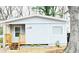 Charming single-story home with a quaint front porch and a well-maintained yard, creating an inviting curb appeal at 1421 Eason St, Atlanta, GA 30314