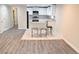 Stylish open-concept kitchen with a breakfast bar island, stainless steel appliances, and modern finishes at 1421 Eason St, Atlanta, GA 30314