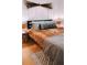 Bedroom with queen bed and patterned pillows at 94 Moury Se Ave, Atlanta, GA 30315
