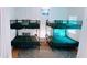 Shared bedroom featuring bunk beds with comfortable mattresses, ideal for siblings or guests at 94 Moury Se Ave, Atlanta, GA 30315