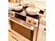 Modern kitchen with stainless steel appliances and light beige cookware at 94 Moury Se Ave, Atlanta, GA 30315