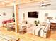 Cozy living room featuring stylish decor, wood floors, and a large flat-screen TV, perfect for relaxation at 94 Moury Se Ave, Atlanta, GA 30315