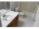 Clean bathroom with toilet, sink, and bathtub at 1835 Freeman Road, Jonesboro, GA 30236