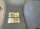 Bedroom with large window and carpet at 1835 Freeman Road, Jonesboro, GA 30236