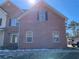 Brick facade of a two-story house with multiple windows at 1835 Freeman Road, Jonesboro, GA 30236