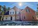 Brick two-story house with a white trim and a porch at 1835 Freeman Road, Jonesboro, GA 30236