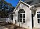 House exterior with white siding and large window at 1835 Freeman Road, Jonesboro, GA 30236