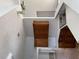 View of kitchen with wood cabinets and hardwood floors at 1835 Freeman Road, Jonesboro, GA 30236