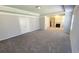 Spacious living room with neutral carpeting, a fireplace, and plenty of room to enjoy at 2536 Dayview Ln, Atlanta, GA 30331