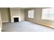 Bright living room features a fireplace and neutral carpet at 2536 Dayview Ln, Atlanta, GA 30331