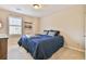 Cozy bedroom with a comfortable bed, soft lighting, and a tranquil atmosphere for restful nights at 2548 Brentmoor Ct, Suwanee, GA 30024