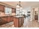 Open kitchen flows into a sunlit dining area and cozy living room at 2548 Brentmoor Ct, Suwanee, GA 30024