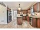 Beautiful kitchen with wood cabinets, stainless steel appliances and tile backsplash at 2548 Brentmoor Ct, Suwanee, GA 30024