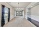 Open dining room features chair rail molding, a chandelier, neutral walls, and a large window at 8051 Nolan Trl, Snellville, GA 30039