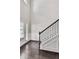 Foyer featuring hardwood floors and a stairway to the second level at 8051 Nolan Trl, Snellville, GA 30039