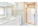 Spa-like bathroom with double vanity and walk-in shower at 1107 E Shoreview Rd, Mcdonough, GA 30253