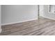 Bedroom featuring new floors, fresh paint, and ample natural light at 6565 Bussell Way, Riverdale, GA 30274