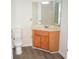 Bright bathroom featuring modern vanity with laminate countertops and tiled walls at 1752 Sw Pryor Sw Rd # 105, Atlanta, GA 30315