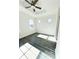 Bright bedroom featuring recessed ceiling, modern ceiling fan, and gray wood-look flooring at 1752 Sw Pryor Sw Rd # 105, Atlanta, GA 30315