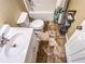 Full bathroom with a toilet, sink, and shower/tub combo at 2650 Batavia St, East Point, GA 30344