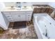 Bathroom with double vanity and a soaking tub at 2650 Batavia St, East Point, GA 30344