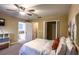 Well-lit bedroom with ceiling fan and ensuite bathroom at 2650 Batavia St, East Point, GA 30344