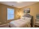 Spacious bedroom with a comfortable bed and window at 2650 Batavia St, East Point, GA 30344