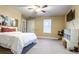 Bright bedroom featuring a ceiling fan and a TV at 2650 Batavia St, East Point, GA 30344