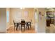 Dining room with hardwood floors and a table for four at 2650 Batavia St, East Point, GA 30344