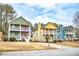 Three charming two-story townhouses with different colored exteriors at 2650 Batavia St, East Point, GA 30344