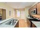 Kitchen with stainless steel appliances and light wood cabinets at 2650 Batavia St, East Point, GA 30344