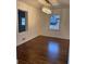 Dining room features hardwood floors, neutral paint and modern lighting at 2773 Fairlane Dr, Atlanta, GA 30354