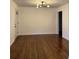 Formal dining room featuring hardwood floors and neutral walls at 2773 Fairlane Dr, Atlanta, GA 30354