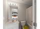 Cozy bathroom with tiled shower, white vanity, modern fixtures, and view into bedroom at 313 Young James Cir, Stockbridge, GA 30281