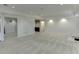 Basement area featuring neutral carpet, recessed lights, and access to additional rooms at 4011 Charrwood Trce, Marietta, GA 30062