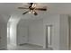 Spacious bedroom with light hardwood floors and a ceiling fan at 4011 Charrwood Trce, Marietta, GA 30062