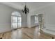 Dining room area with hardwood floors and staircase views at 4011 Charrwood Trce, Marietta, GA 30062