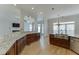 Open kitchen featuring granite countertops, stainless steel appliances, and hardwood floors at 4011 Charrwood Trce, Marietta, GA 30062