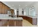 Spacious kitchen featuring granite countertops, stainless steel appliances and wooden cabinets at 4011 Charrwood Trce, Marietta, GA 30062