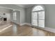 Inviting living space with hardwood floors, a large window, and neutral decor at 4011 Charrwood Trce, Marietta, GA 30062