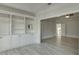 Bright living room with custom built-in shelving and an open layout at 4011 Charrwood Trce, Marietta, GA 30062