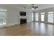 Bright living room with fireplace, TV, and plenty of natural light at 4011 Charrwood Trce, Marietta, GA 30062