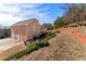 View of house exterior, showcasing a driveway and landscaping at 2270 Washington Dr, Douglasville, GA 30135