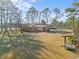 Large backyard with mature trees and open space at 2555 Klondike Sw Rd, Conyers, GA 30094