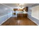 Spacious dining area with hardwood floors and light gray walls at 2555 Klondike Rd Sw, Conyers, GA 30094