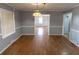 Bright dining room with hardwood floors and gray walls at 2555 Klondike Sw Rd, Conyers, GA 30094