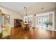 Elegant dining area with hardwood floors and stylish decor, perfect for entertaining guests at 320 Jessica Way, Canton, GA 30114