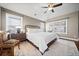 Cozy main bedroom with natural light and a soothing color palette, creating a relaxing retreat at 320 Jessica Way, Canton, GA 30114